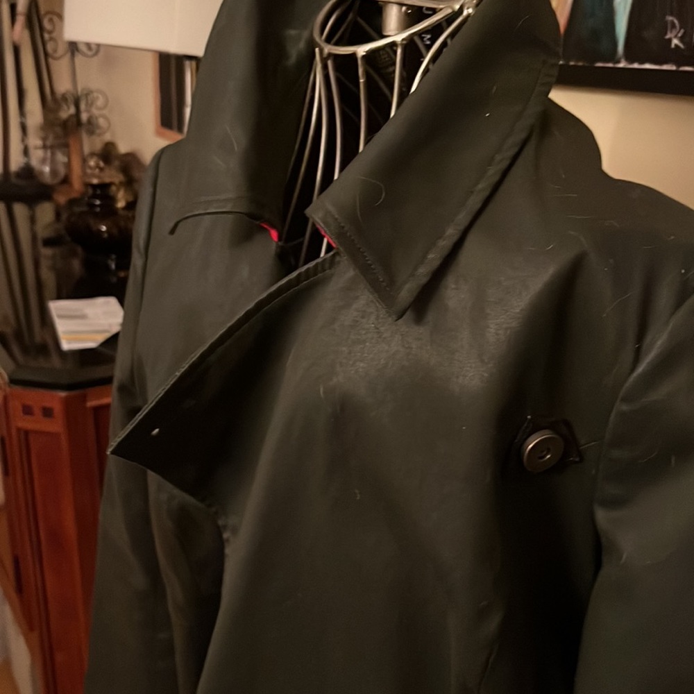 Unique “Operations Wear” brand trenchcoat. No defunct company. Size small